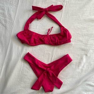 Frankies Bikini’s hot pink swimsuit